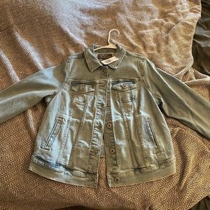 Light Blue Torrid Denim Jean Jacket. NWT. Plenty of stretch. Size 0.